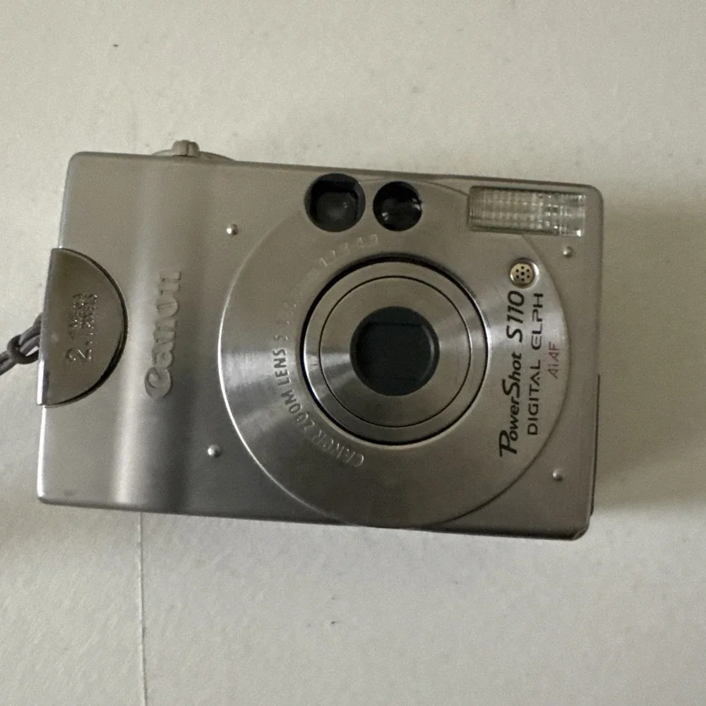 Vtg Canon PowerShot S110 Digital ELPH Camera 2.1MP 2X Zoom Silver Untested